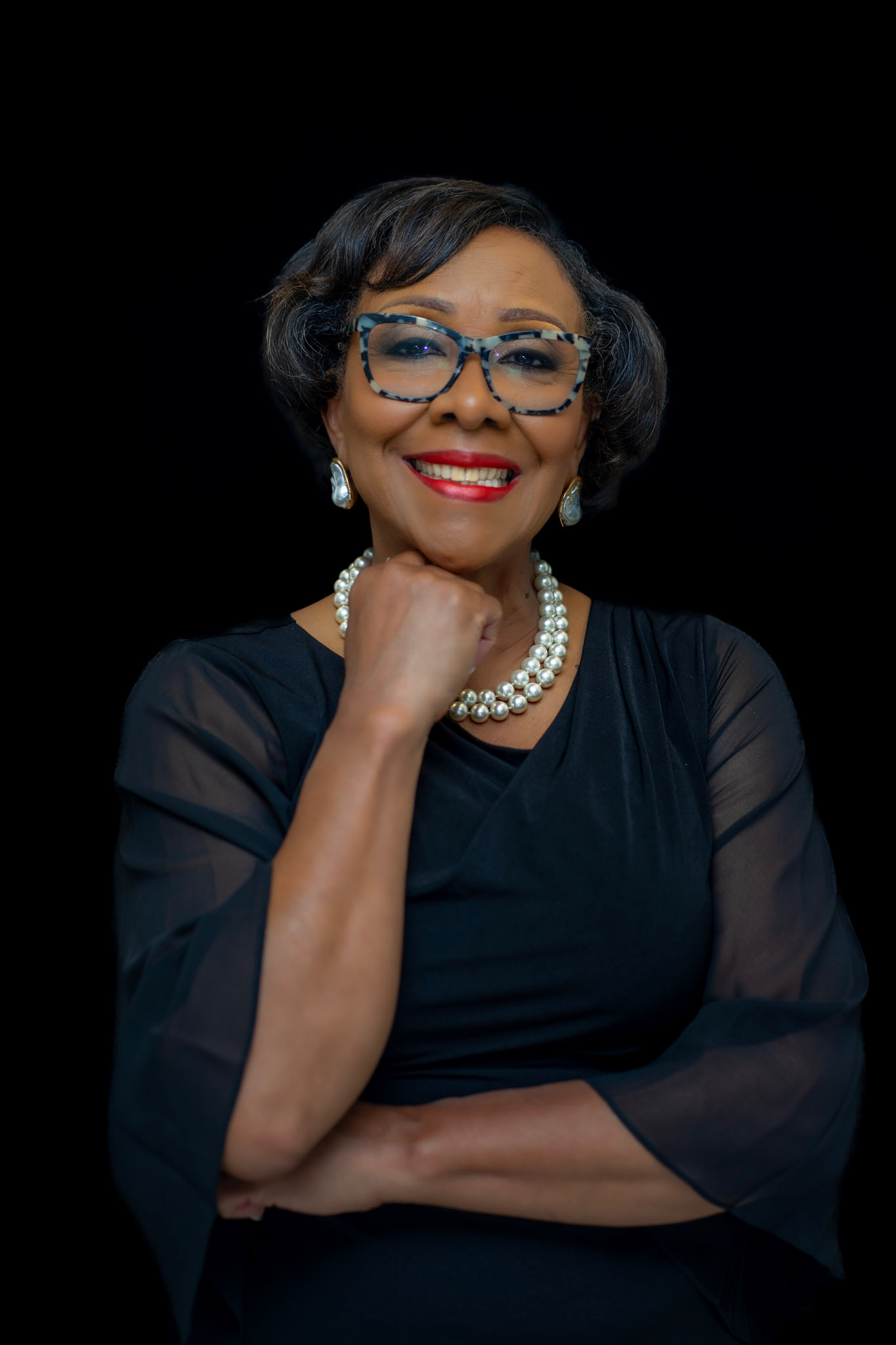 Blank brown leather book with three leafed pages fell out, brown table.